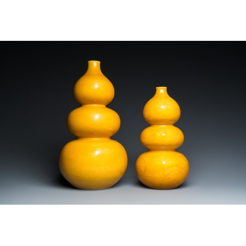 5 - Two Chinese monochrome yellow-glazed triple gourd vases with incised designs of lotus scrolls and dr... 