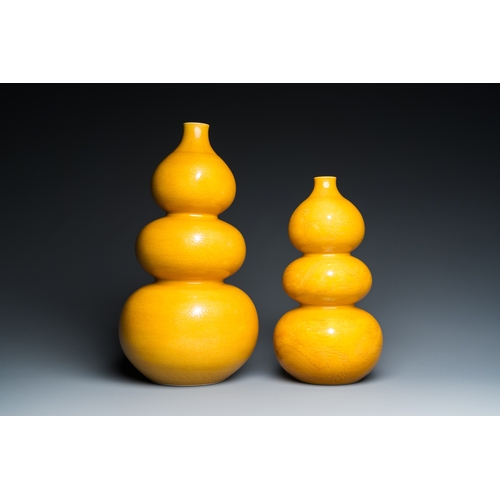 5 - Two Chinese monochrome yellow-glazed triple gourd vases with incised designs of lotus scrolls and dr... 