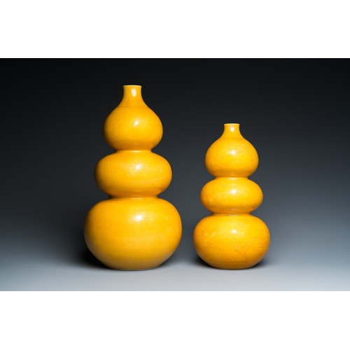 5 - Two Chinese monochrome yellow-glazed triple gourd vases with incised designs of lotus scrolls and dr... 