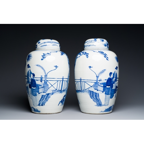 50 - A pair of large Chinese blue and white jars and covers with ladies playing a game of go, 19th C.Desc... 