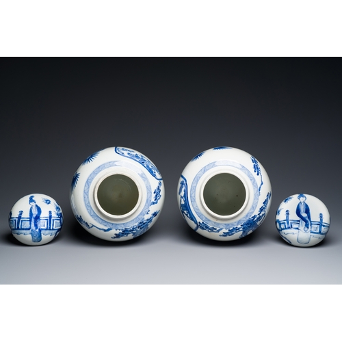 50 - A pair of large Chinese blue and white jars and covers with ladies playing a game of go, 19th C.Desc... 