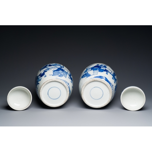 50 - A pair of large Chinese blue and white jars and covers with ladies playing a game of go, 19th C.Desc... 