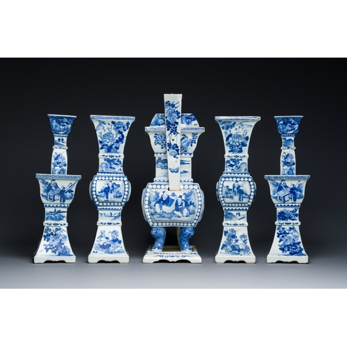 51 - A large Chinese blue and white five-piece altar garniture, 19th C.Description:H.: 45,5 cm (the incen... 