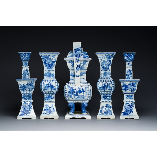 51 - A large Chinese blue and white five-piece altar garniture, 19th C.Description:H.: 45,5 cm (the incen... 