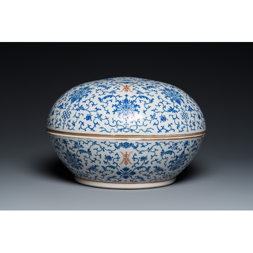 56 - A large round Chinese box and cover with overglaze blue enamel lotus design, Guangxu mark and of the... 