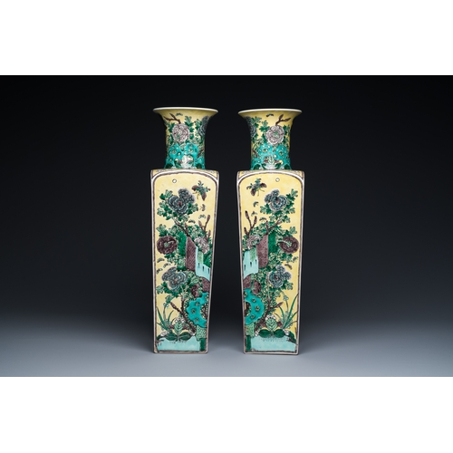 6 - A pair of Chinese square yellow-ground famille verte vases, Kangxi mark, 19th C.Description:H.: 51 c... 