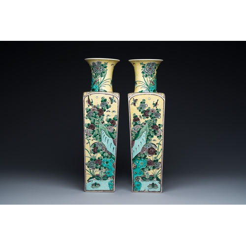 6 - A pair of Chinese square yellow-ground famille verte vases, Kangxi mark, 19th C.Description:H.: 51 c... 