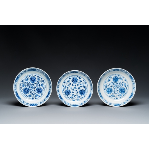 67 - Three Chinese blue and white 'lotus scroll' plates, Guangxu mark and of the periodDescription:Dia.: ... 