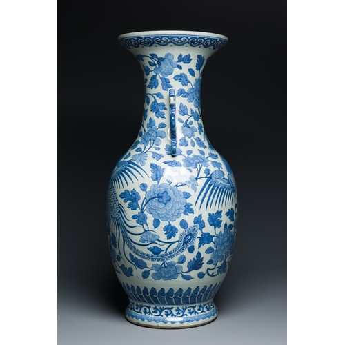 81 - A large Chinese blue and white dragon-handled 'phoenix and peony' vase, 19th C.Description:H.: 82 cm... 