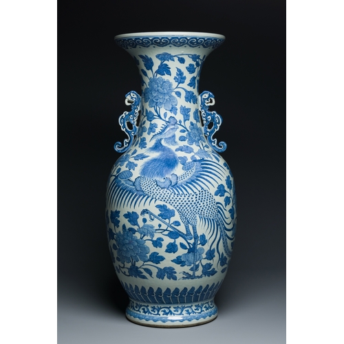 81 - A large Chinese blue and white dragon-handled 'phoenix and peony' vase, 19th C.Description:H.: 82 cm... 