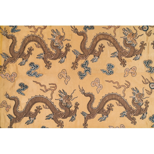 108 - A Chinese yellow-ground silk embroidery decorated with sixteen five-clawed dragons, Da Ming å¤§æ m... 