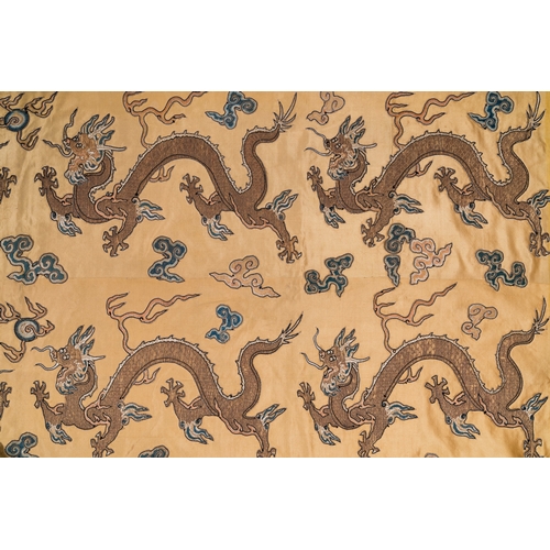 108 - A Chinese yellow-ground silk embroidery decorated with sixteen five-clawed dragons, Da Ming å¤§æ m... 