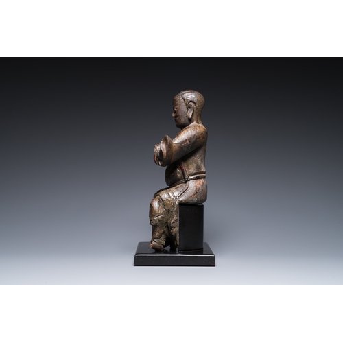 117 - A Chinese lacquered and polychromed wood sculpture of a Buddhist guardian, MingDescription:H.: 42,5 ... 