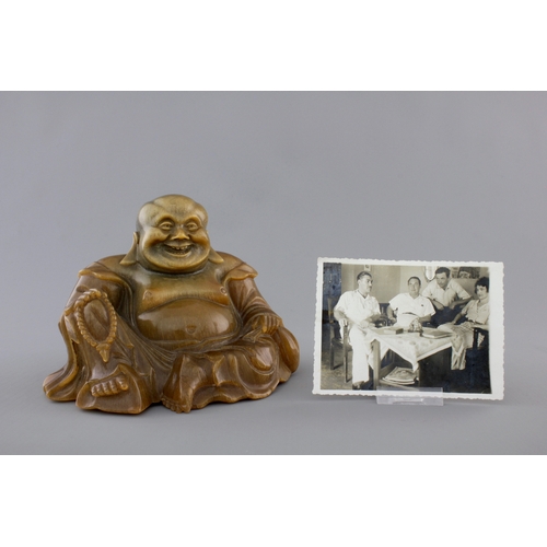 118 - A rare Chinese horn sculpture of Buddha, 19th C.Description:Please note this lot is subject to and i... 