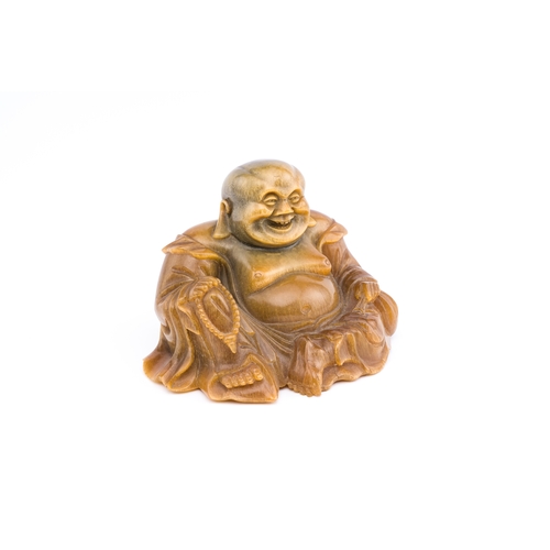 118 - A rare Chinese horn sculpture of Buddha, 19th C.Description:Please note this lot is subject to and i... 