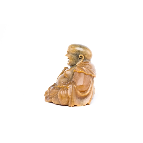 118 - A rare Chinese horn sculpture of Buddha, 19th C.Description:Please note this lot is subject to and i... 