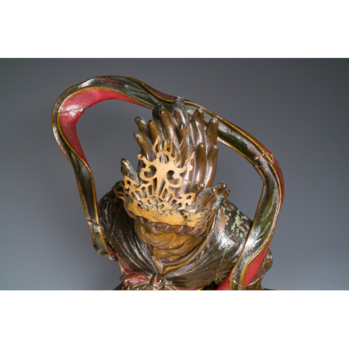 119 - A large Japanese polychromed and gilt-lacquered wood figure of a divine general, Edo, dated 1623Desc... 