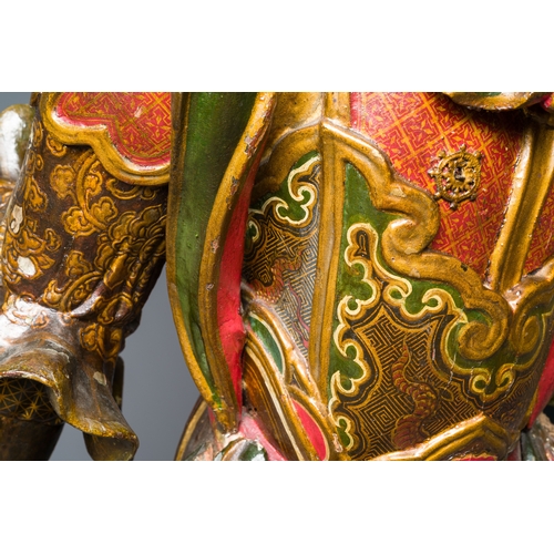 119 - A large Japanese polychromed and gilt-lacquered wood figure of a divine general, Edo, dated 1623Desc... 