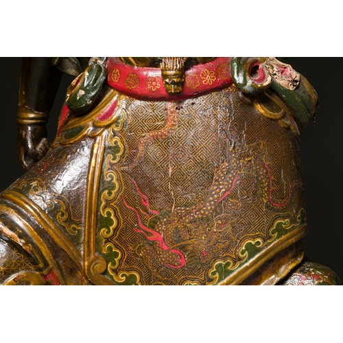 119 - A large Japanese polychromed and gilt-lacquered wood figure of a divine general, Edo, dated 1623Desc... 