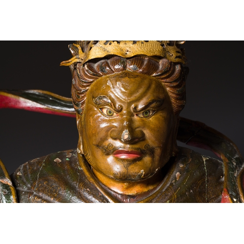 119 - A large Japanese polychromed and gilt-lacquered wood figure of a divine general, Edo, dated 1623Desc... 