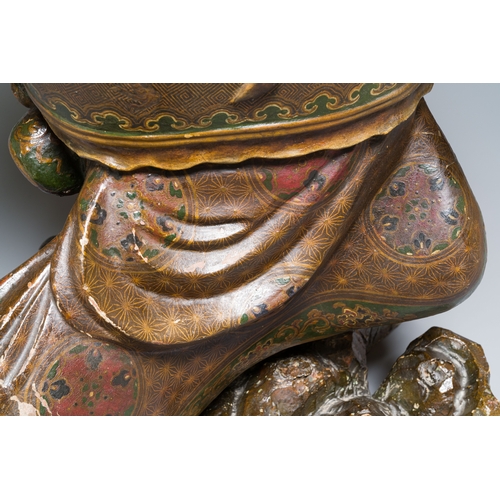 119 - A large Japanese polychromed and gilt-lacquered wood figure of a divine general, Edo, dated 1623Desc... 