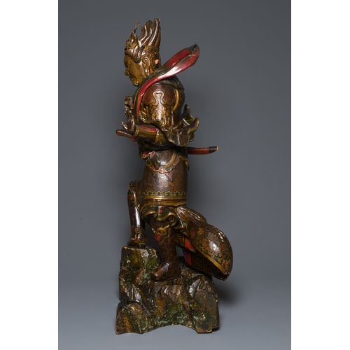 119 - A large Japanese polychromed and gilt-lacquered wood figure of a divine general, Edo, dated 1623Desc... 