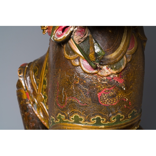 119 - A large Japanese polychromed and gilt-lacquered wood figure of a divine general, Edo, dated 1623Desc... 