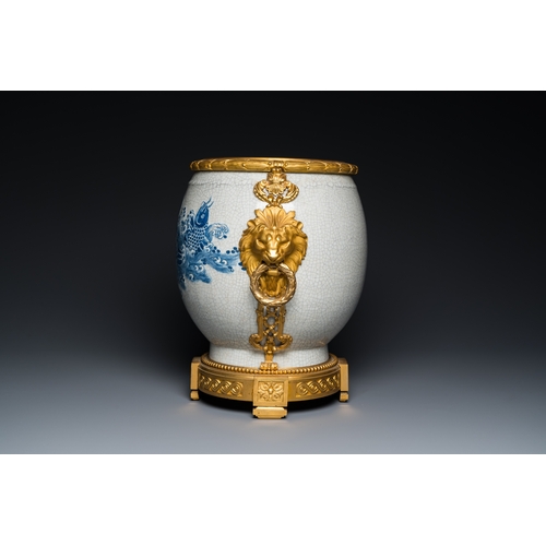 122 - A large Chinese blue and white crackle-glazed 'carps' vase with fine gilt bronze mounts, 18/19th C.D... 