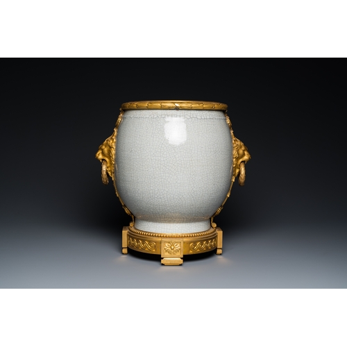 122 - A large Chinese blue and white crackle-glazed 'carps' vase with fine gilt bronze mounts, 18/19th C.D... 