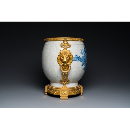 122 - A large Chinese blue and white crackle-glazed 'carps' vase with fine gilt bronze mounts, 18/19th C.D... 