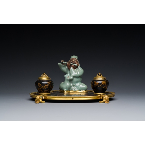 124 - A French lacquered and painted wood, gilt bronze and Japanese celadon porcelain inkwell desk set, la... 