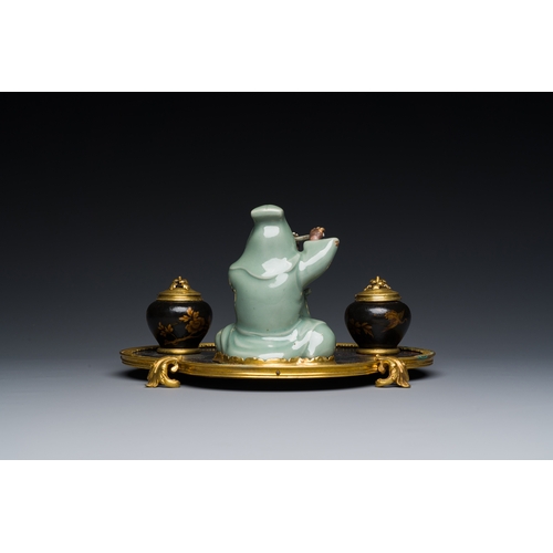 124 - A French lacquered and painted wood, gilt bronze and Japanese celadon porcelain inkwell desk set, la... 