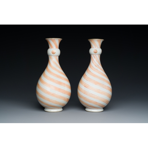 131 - A rare pair of Chinese bottle vases with iron-red design in the style of Venetian glass, KangxiDescr... 