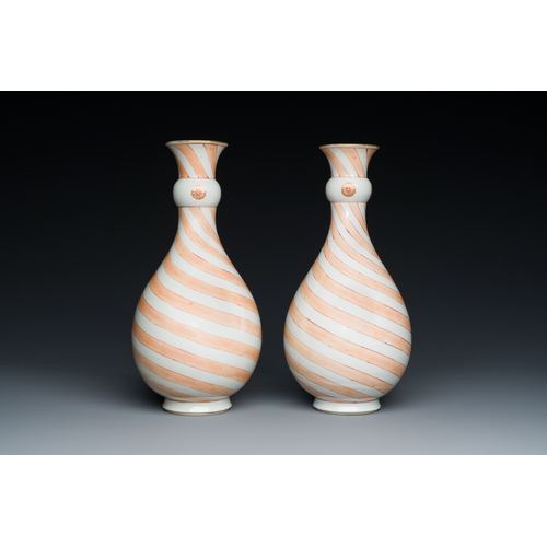 131 - A rare pair of Chinese bottle vases with iron-red design in the style of Venetian glass, KangxiDescr... 