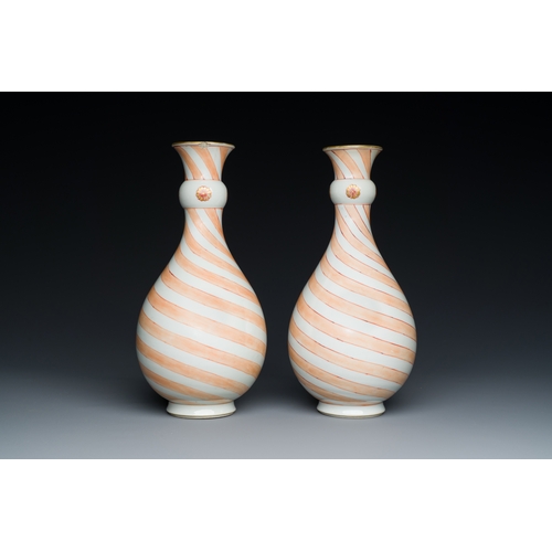 131 - A rare pair of Chinese bottle vases with iron-red design in the style of Venetian glass, KangxiDescr... 