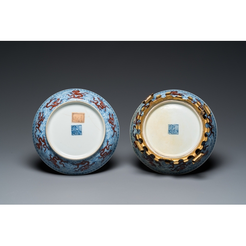 134 - A pair of Chinese iron-red and underglaze-blue 'dragon' dishes, Qianlong mark and of the periodDescr... 