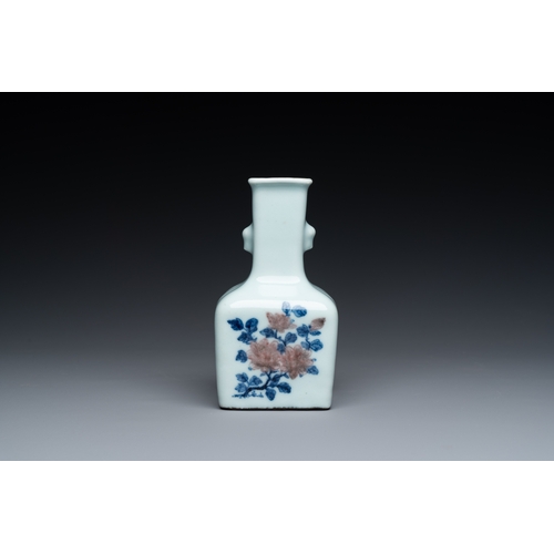 145 - A small Chinese celadon-ground blue, white and copper-red bottle vase, Qianlong mark and of the peri... 