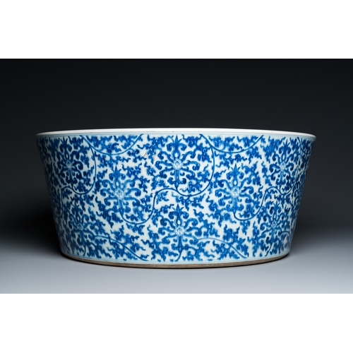 147 - An exceptionally large Chinese blue and white basin with floral scrolls, KangxiDescription:Dia.: 60,... 