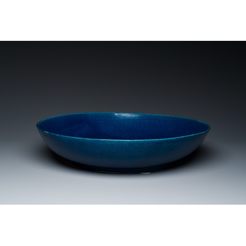 148 - A very large Chinese monochrome blue-glazed dish, KangxiDescription:Dia.: 50 cm - H.: 11 cmCondition... 