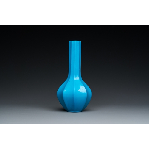 153 - A Chinese turquoise blue Peking glass facetted bottle vase, Qianlong mark and of the periodDescripti... 