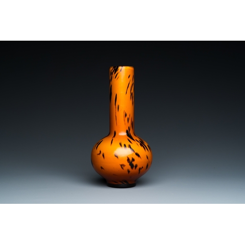 154 - A Chinese spotted amber-coloured Peking glass bottle vase, Xianfeng mark and of the periodDescriptio... 