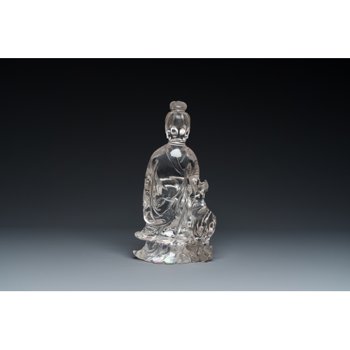 160 - A large Chinese rock crystal sculpture of Lan Caihe, 19th C.Description:H.: 32 cm (incl. the stand)H... 