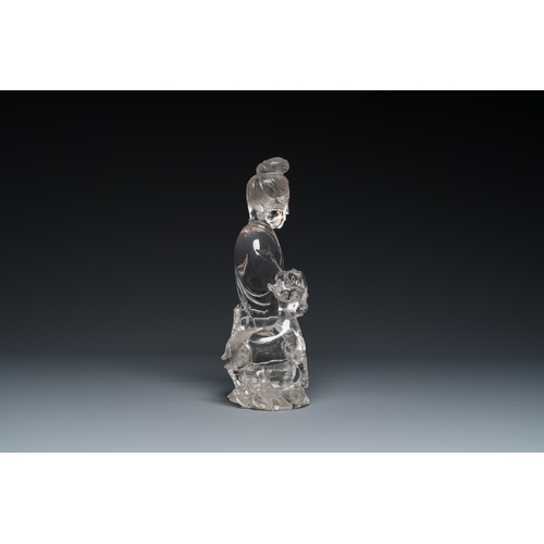 160 - A large Chinese rock crystal sculpture of Lan Caihe, 19th C.Description:H.: 32 cm (incl. the stand)H... 