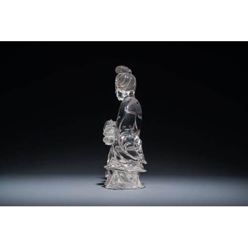 160 - A large Chinese rock crystal sculpture of Lan Caihe, 19th C.Description:H.: 32 cm (incl. the stand)H... 