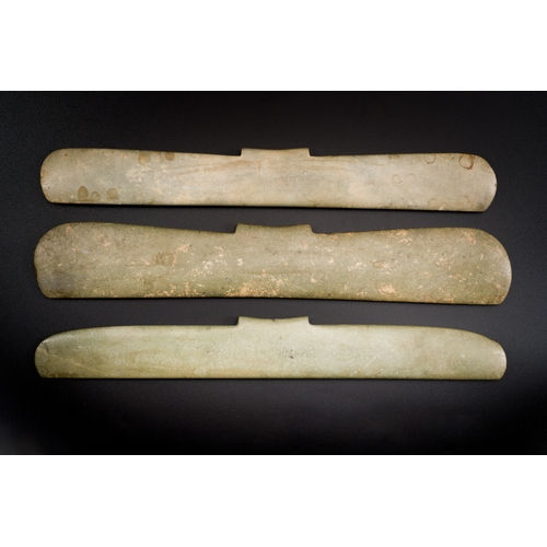 173 - Three Chinese archaic calcified jade pendants, probably Liangzhu cultureDescription:L.: 32 cm - H.: ... 