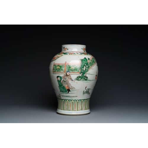 184 - A Chinese famille verte vase with reticulated wooden cover and stand, KangxiDescription:H.: 35 cm (v... 