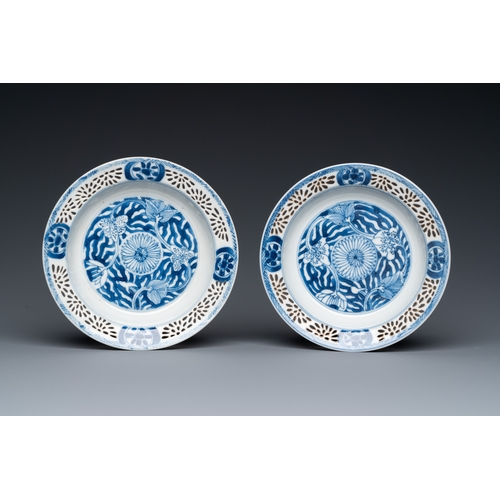 204 - A pair of Chinese blue and white reticulated double-walled cups and saucers, KangxiDescription:Dia.:... 