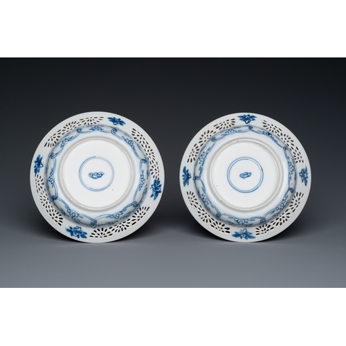 204 - A pair of Chinese blue and white reticulated double-walled cups and saucers, KangxiDescription:Dia.:... 