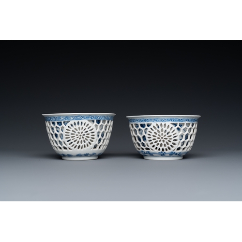 204 - A pair of Chinese blue and white reticulated double-walled cups and saucers, KangxiDescription:Dia.:... 