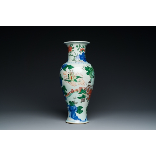 212 - A Chinese wucai 'immortals' vase, Transitional periodDescription:H.: 38,5 cmCondition:The absence of... 